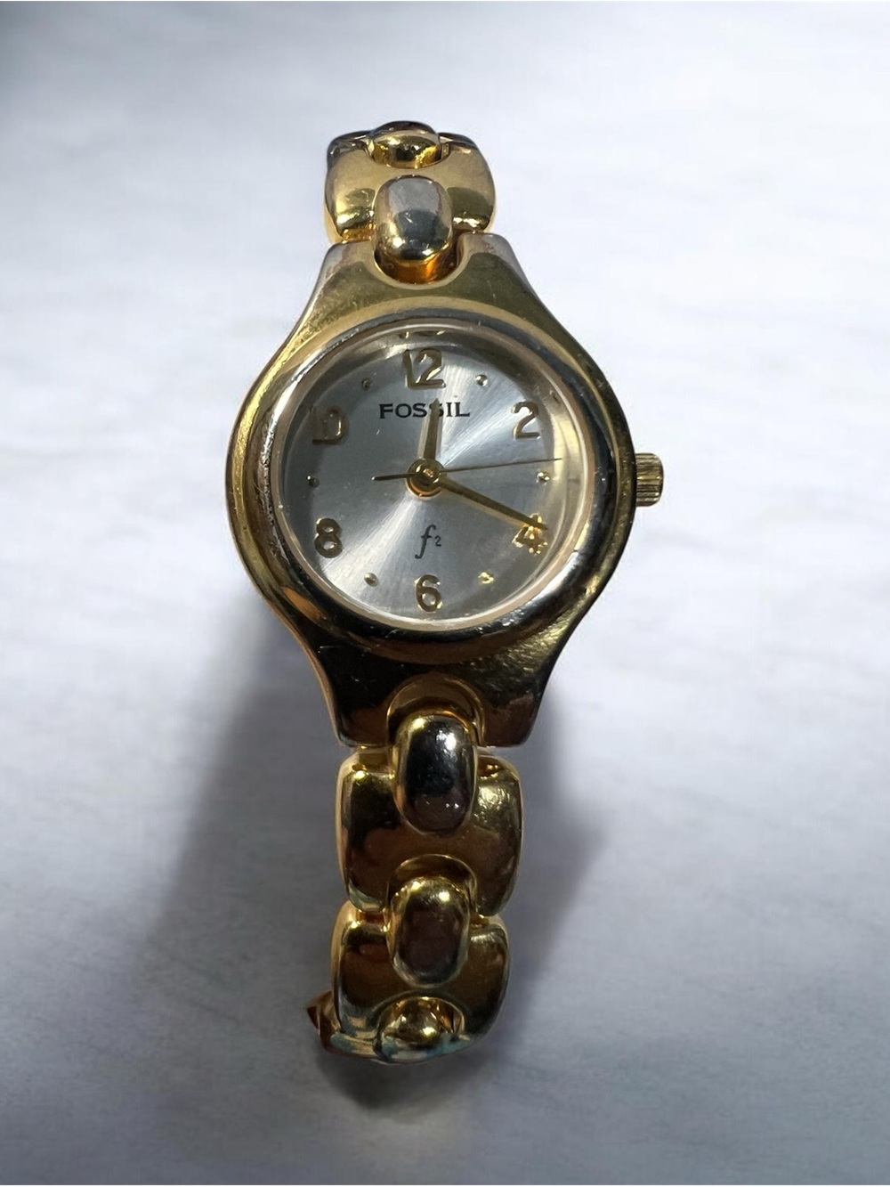 (193)Women Fossil Gold Tone Bracelet Watch with Silver Dial